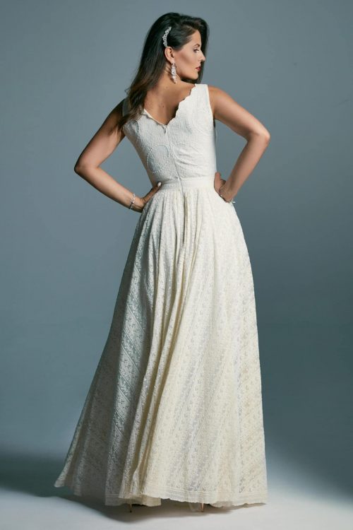 A wedding dress with wide straps and a classic cut with a slit Barcelona 11