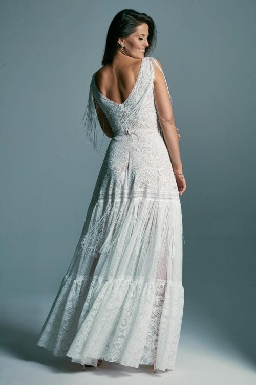 A richly decorated lace wedding dress, finished with fringes Santorini 5
