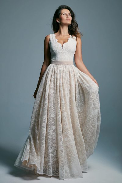 A beautiful, conservative wedding dress with an extremely fashionable cut Porto 45