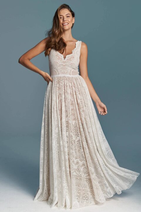 suknia ślubna z koronkowym górnym panelem i rozkloszowanym dołem w jasnym kolorze