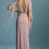 suknia w kolorze różowym z dekoltem w serek, zdobiona frędzlami i wzorem w romby
